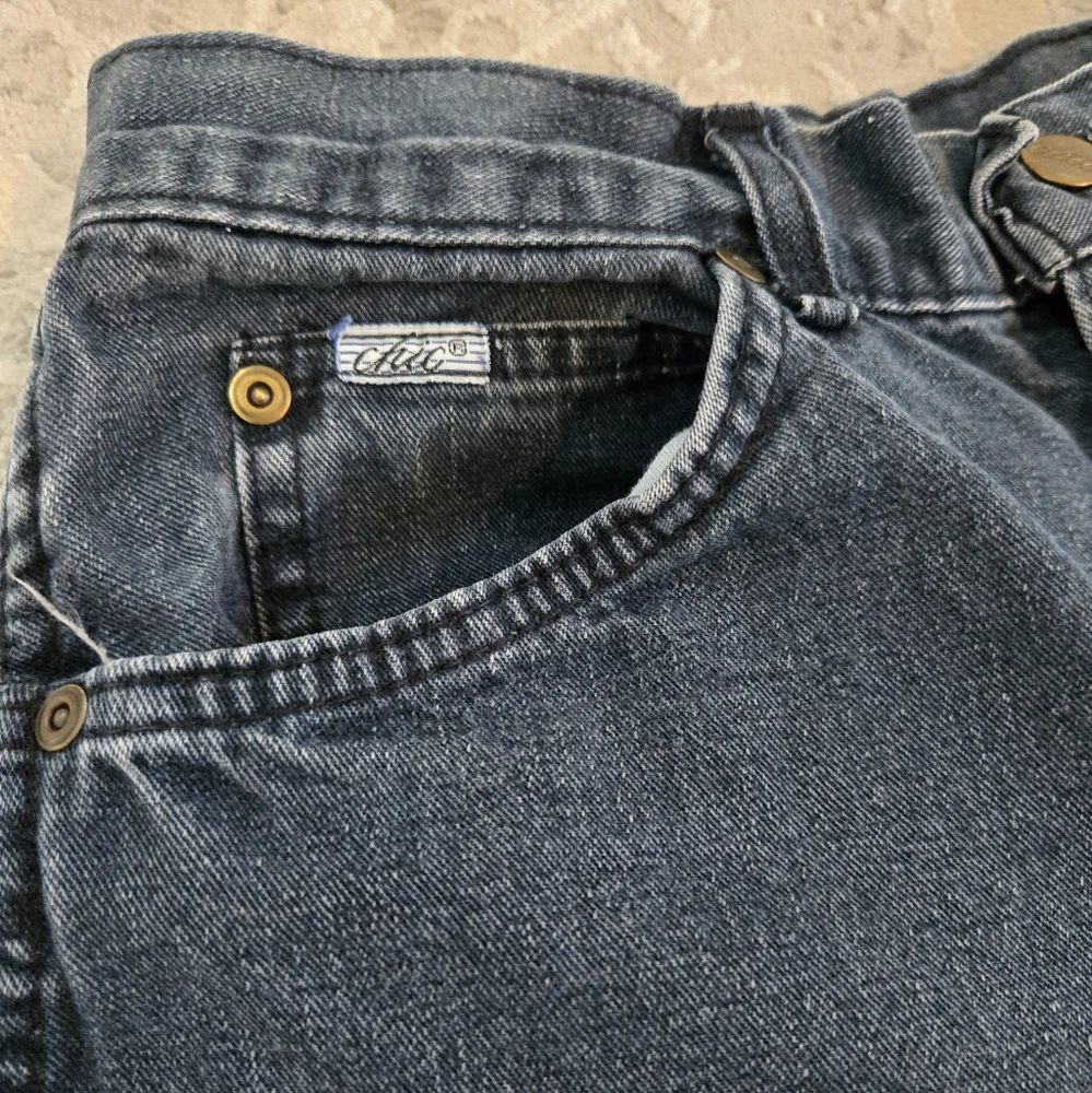 Vintage 1990s Chic Black Denim Long Shorts